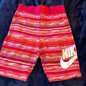 Nike multi color shorts retro look men size small women can wear them too.